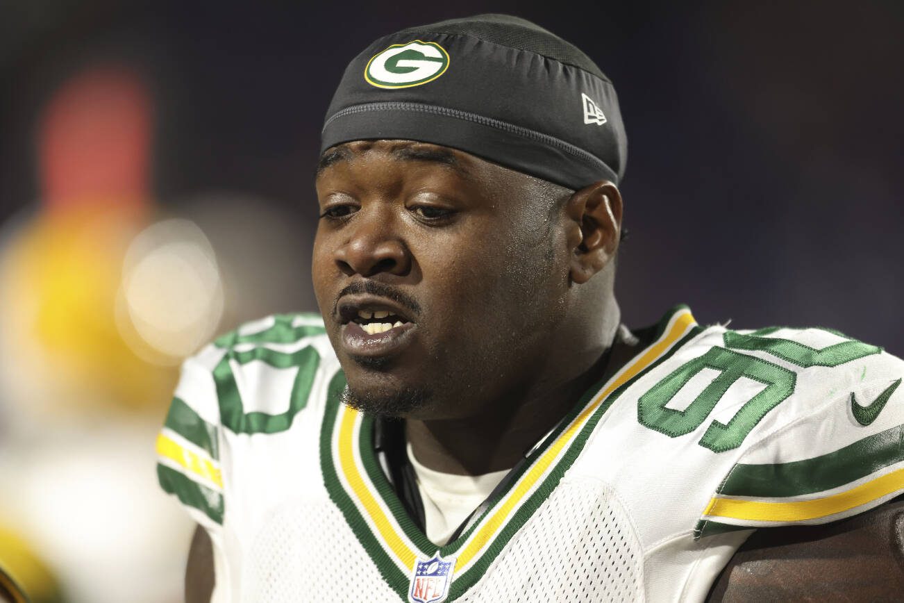 Green Bay Packers defensive tackle Jarran Reed (90) reacts during an NFL football game against the Buffalo Bills, Sunday, Oct. 30, 2022, in Orchard Park, N.Y. (AP Photo/Bryan Bennett)