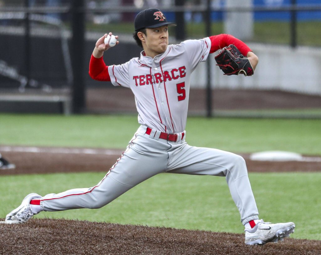 Mountlake Terrace’s Tyler Song (5) pitches during a baseball game between Edmonds-Woodway and Mountlake Terrace at Edmonds-Woodway High School in Edmonds, Washington on Thursday, April 13, 2023. The Warriors won, 5-1. (Annie Barker / The Herald)
