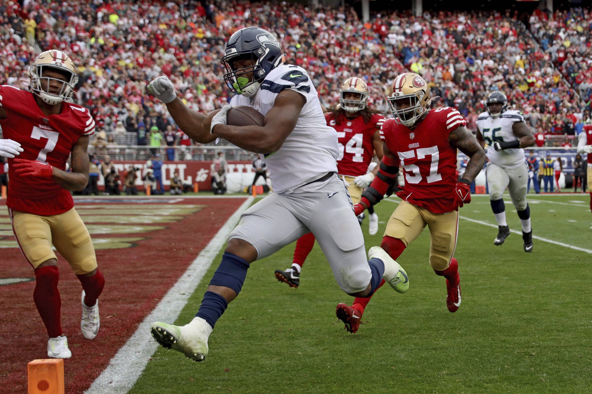 Seattle Seahawks running back Kenneth Walker III (9) runs for a touchdown during an NFL wild card playoff football game against the San Francisco 49ers on Saturday, Jan.14, 2023, in Santa Clara, Calif. (AP Photo/Scot Tucker)