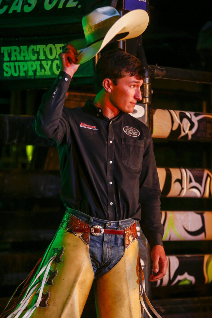 A rider enters the arena during Unleash The Beast at Angel of the Winds Arena in Everett, Washington on Thursday, April 20, 2023. (Annie Barker / The Herald)
