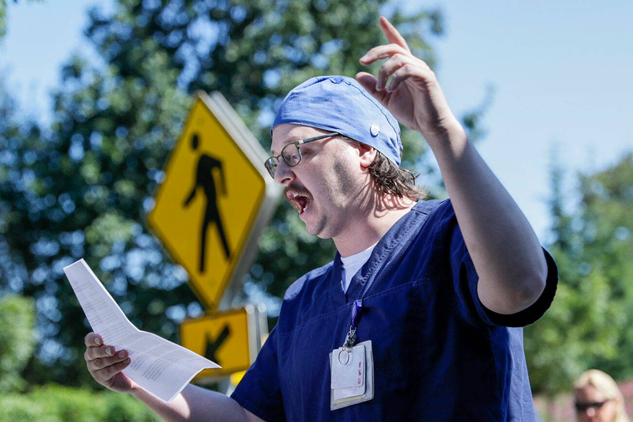 Trevor Gjendem addresses a gathering a hospital staff members, supporters and elected officials Wednesday afternoon in Everett, Washington on August 24, 2022.  (Kevin Clark / The Herald)