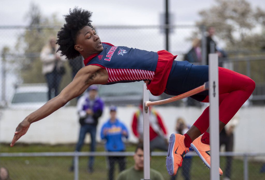 Kennedy Catholic’s Geron White performs the high jump during the Eason Invitational at Veterans Memorial Stadium in Snohomish, Washington on Saturday, April 22, 2023. His highest jump was six feet eight inches. (Annie Barker / The Herald)
