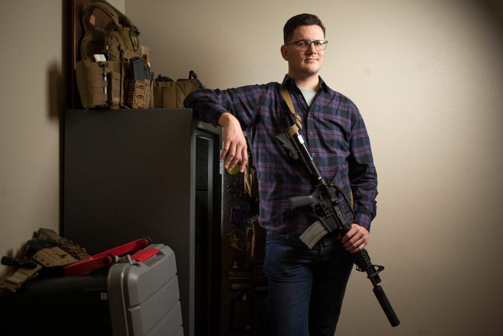 Brett Bass of Edmonds, photographed in 2018, is one of several individuals suing the state over a trio of bills meant to address gun violence. He sued in U.S. District Court in Tacoma on Tuesday, saying the law violates the constitutional right to keep and bear arms. (Andy Bronson / The Herald)
