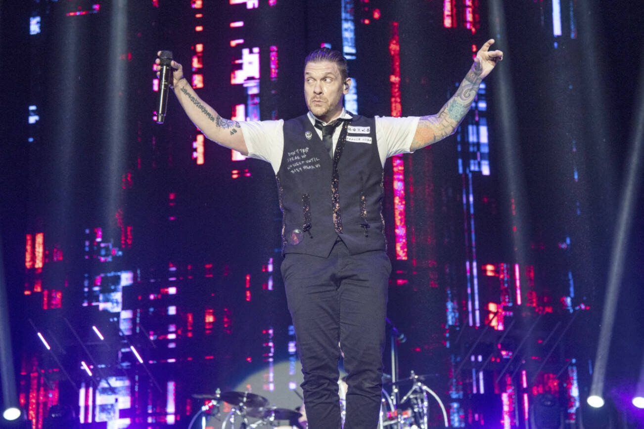 Brent Smith of Shinedown performs at the Louder Than Life Music Festival at the Kentucky Exposition Center on Friday, Sept. 23, 2022, in Louisville, Ky. (Photo by Amy Harris/Invision/AP)