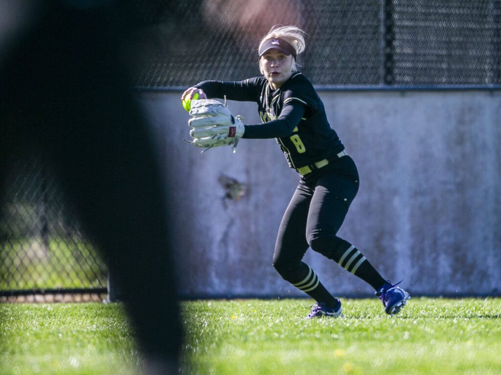 Lake Stevens’ Zoe Hopkins fields a ball during the game against Glacier Peak on Tuesday, April 25, 2023 in Lake Stevens, Washington. (Olivia Vanni / The Herald)
