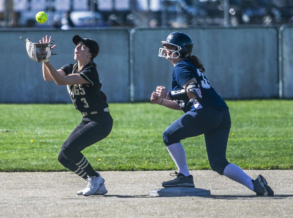 Lake Stevens’ Ava Heston reaches out for the ball during a game against Glacier Peak on Tuesday, April 25, 2023 in Lake Stevens, Washington. (Olivia Vanni / The Herald)
