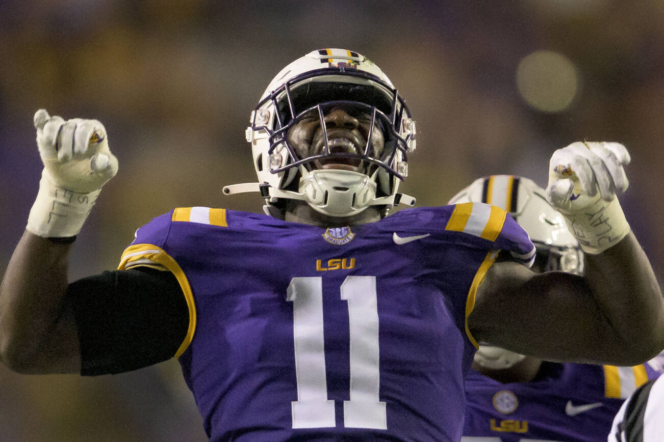 LSU defensive end Ali Gaye (11) celebrates a sack during an NCAA football game against New Mexico on Saturday, Sept. 24, 2022, in New Orleans. (AP Photo/Matthew Hinton)