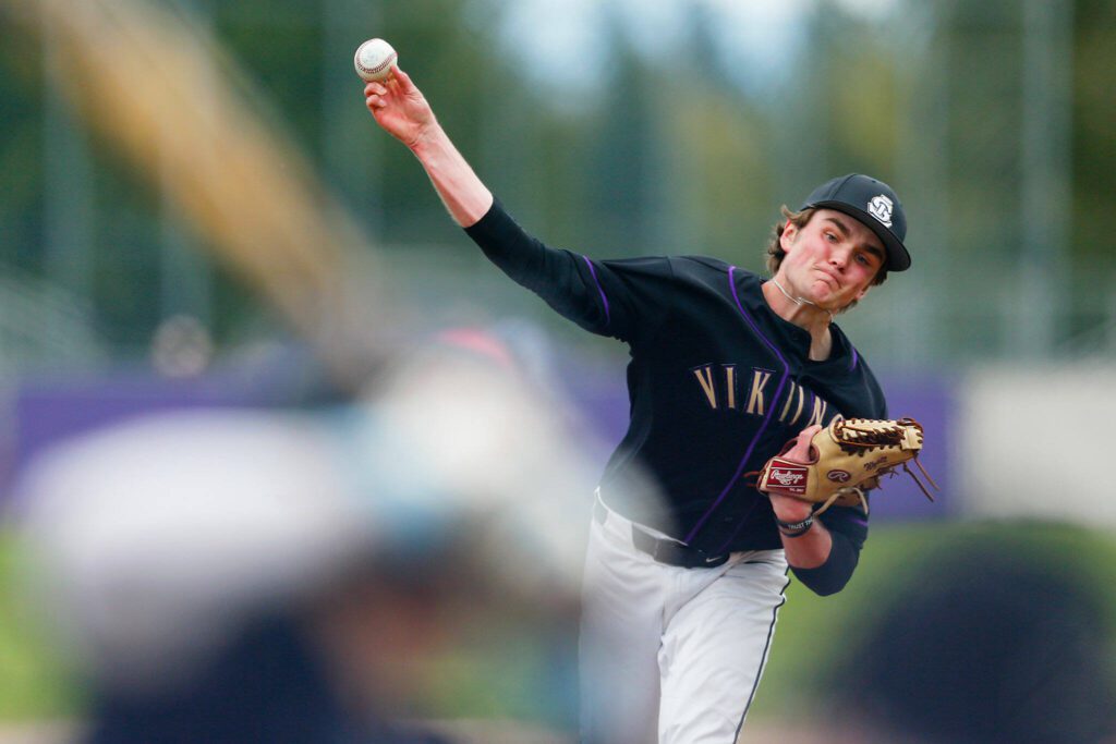 Lake Stevens’ Wyatt Queen delivers a pitch in a win over Jackson on Wednesday, April 26, 2023, in Lake Stevens, Washington. (Ryan Berry / The Herald)
