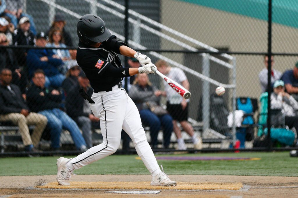Jackson’s Sean Bang lines out hard to the third baseman against Lake Stevens on Wednesday, April 26, 2023, in Lake Stevens, Washington. (Ryan Berry / The Herald)
