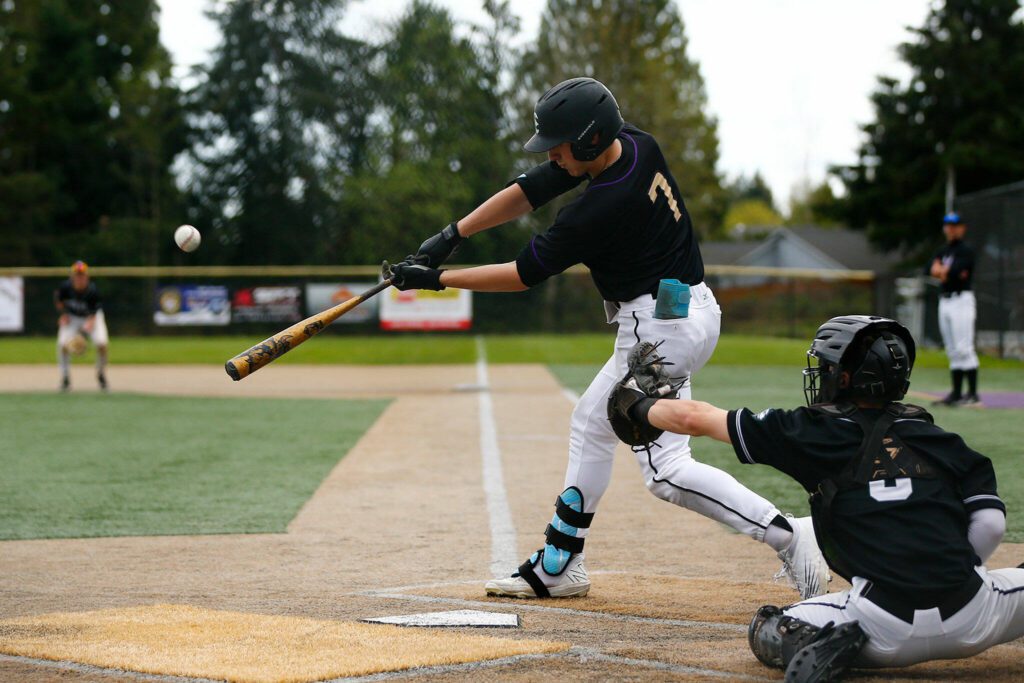 Lake Stevens’ Colin Beazizo drives in a run in a win over Jackson on Wednesday, April 26, 2023, in Lake Stevens, Washington. (Ryan Berry / The Herald)

