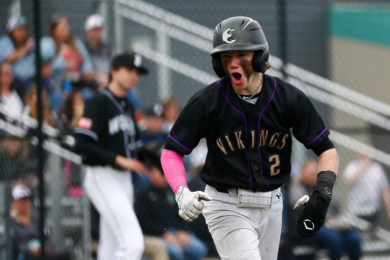 Lake Stevens’ Aspen Alexander shouts after tallying the tying run in a win over Jackson on Wednesday, April 26, 2023, in Lake Stevens, Washington. (Ryan Berry / The Herald)