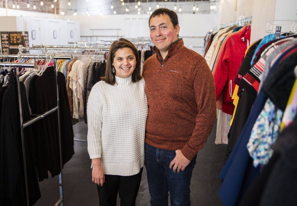 Cassandra Bell and husband Matthew Bell at their second hand story Cassandra’s Closet on Wednesday, Nov. 23, 2022 in Everett, Washington. (Olivia Vanni / The Herald)
