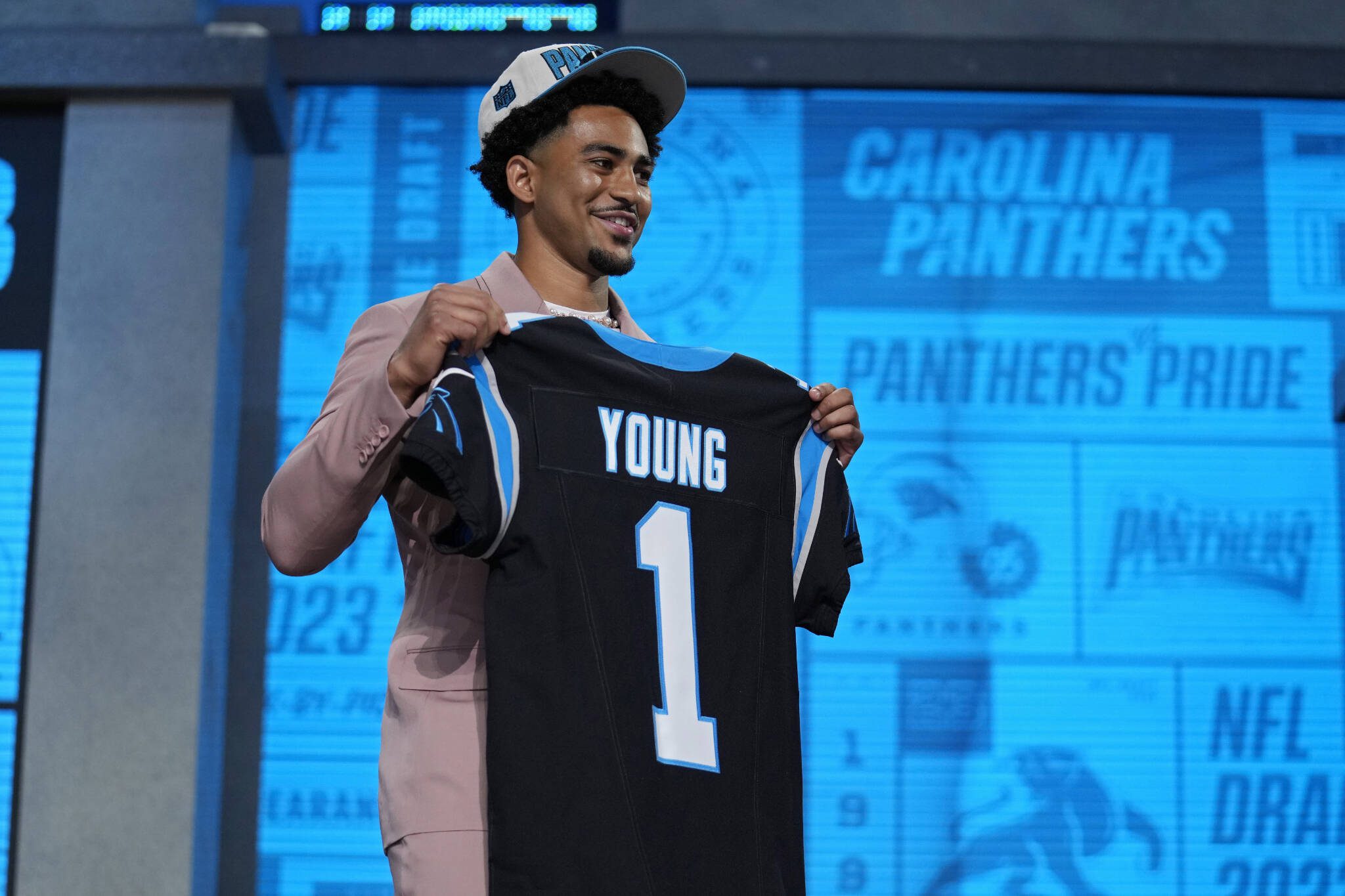 Alabama quarterback Bryce Young poses after being chosen by Panthers with the first-overall pick in the NFL draft on Thursday in Kansas City, Mo. (AP Photo/Jeff Roberson)
