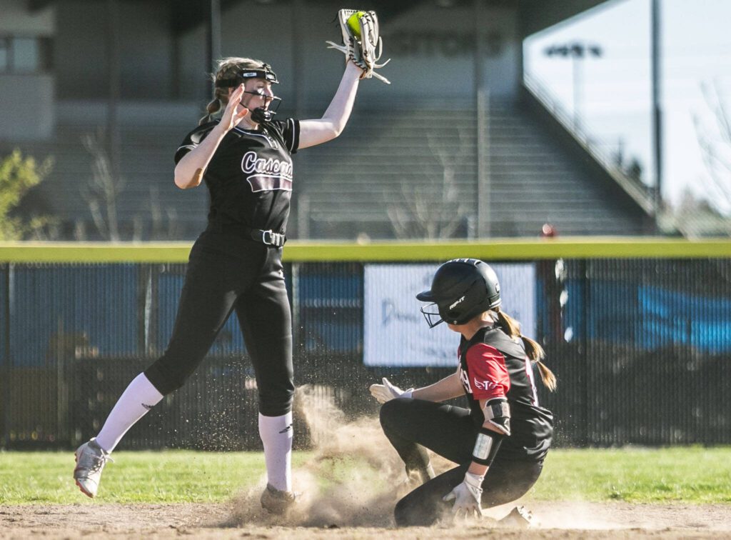 Cascade&rsquo;s Allison Gehrig jumps to try an catch a throw to second during the game against Snohomish on Friday, April 28, 2023 in Snohomish, Washington. (Olivia Vanni / The Herald)
