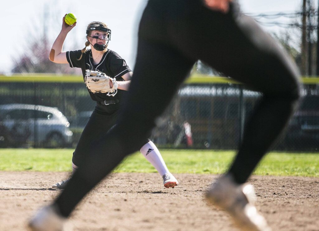 Cascade&rsquo;s Allison Gehrig throws to first during the game against Snohomish on Friday, April 28, 2023 in Snohomish, Washington. (Olivia Vanni / The Herald)
