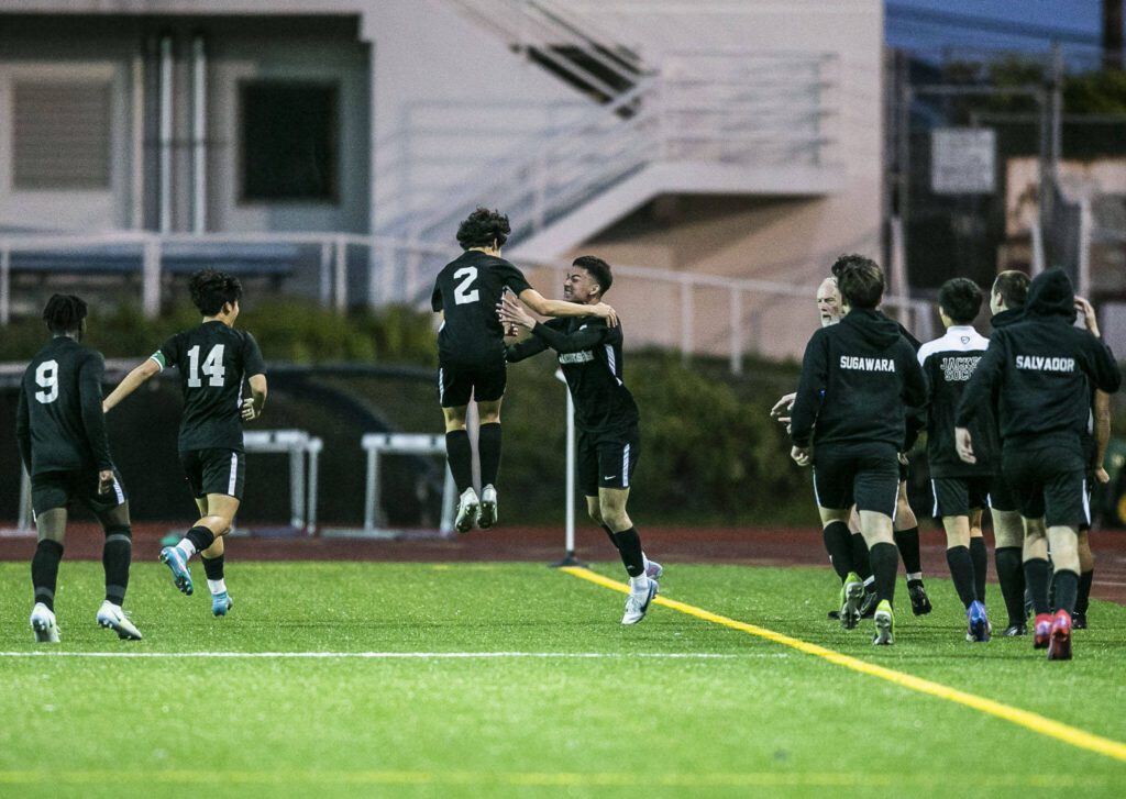 Jackson players celebrate a goal during the game against Glacier Peak on Friday, April 28, 2023 in Snohomish, Washington. (Olivia Vanni / The Herald)
