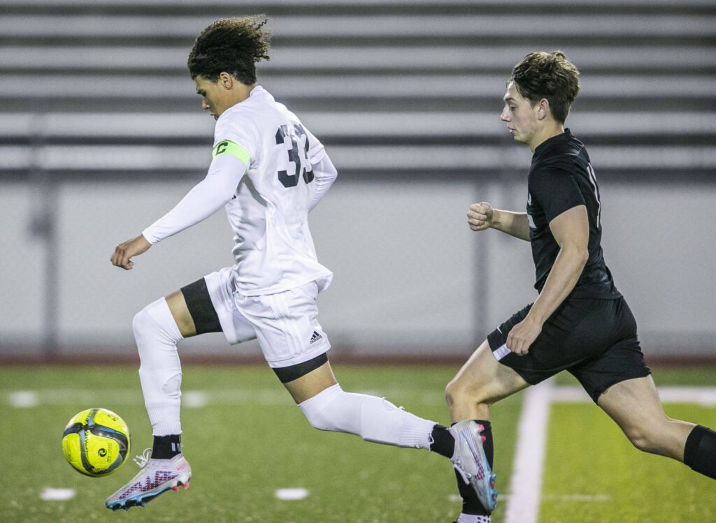 Glacier Peak’s Azavier Coppin almost gets a breakaway during the game against Jackson on Friday, April 28, 2023 in Snohomish, Washington. (Olivia Vanni / The Herald)
