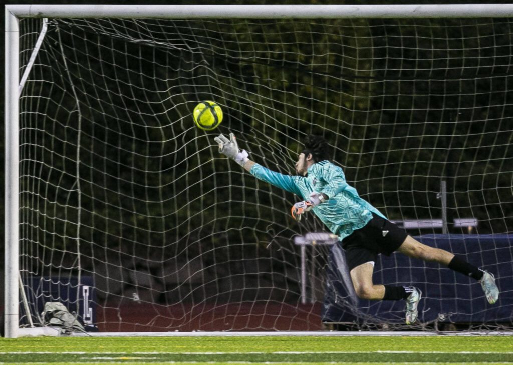 A goal gets past Glacier Peak’s goalie during the game against Jackson on Friday, April 28, 2023 in Snohomish, Washington. (Olivia Vanni / The Herald)
