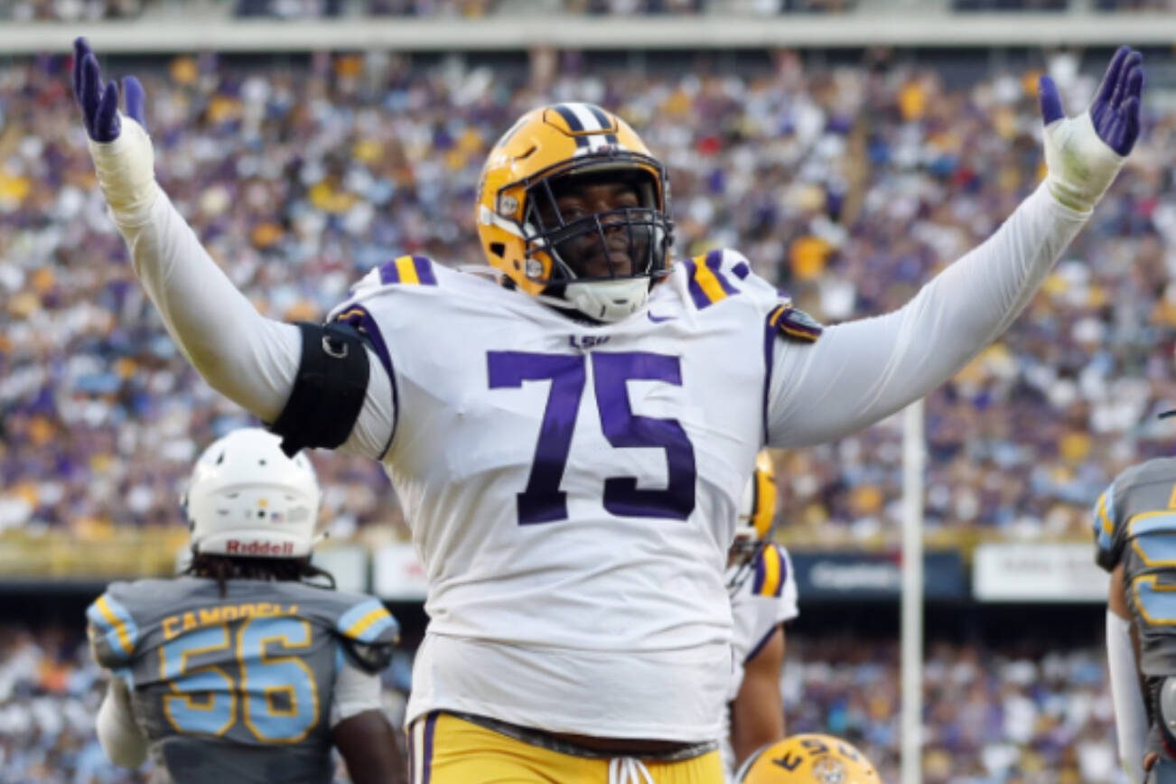 LSU offensive lineman Anthony Bradford (75) celebrates after a play during the first half of an NCAA college football game against Southern in Baton Rouge, La., Saturday, Sept. 10, 2022. LSU won 65-17. (AP Photo/Tyler Kaufman)