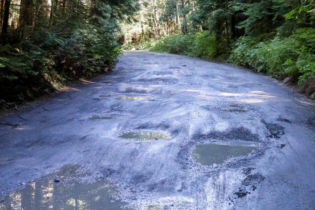 Ruts on Mt. Pilchuck Road Wednesday afternoon in Granite Falls, Washington on September 7, 2022. Construction and repairs on the road will start this summer. (Kevin Clark / The Herald)
