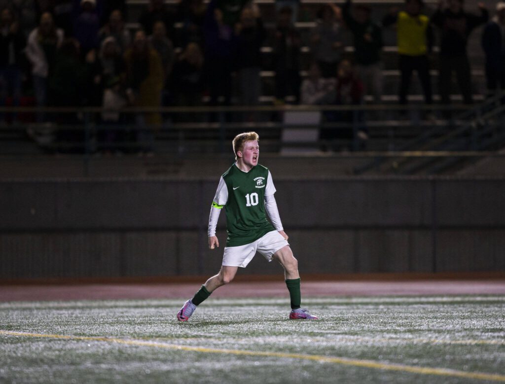Edmonds-Woodway’s Ben Hanson reacts to his goal during the game against Everett on Monday, May 1, 2023 in Edmonds, Washington. (Olivia Vanni / The Herald)
