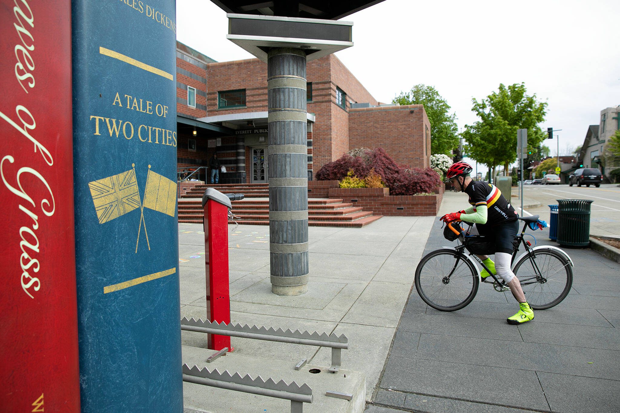 Librarian Phillip Buffington, 54, pulls up to the Everett Public Library on his fixed-gear bicycle at the conclusion of his 30-mile morning commute from Capitol Hill in Seattle. (Ryan Berry / The Herald)