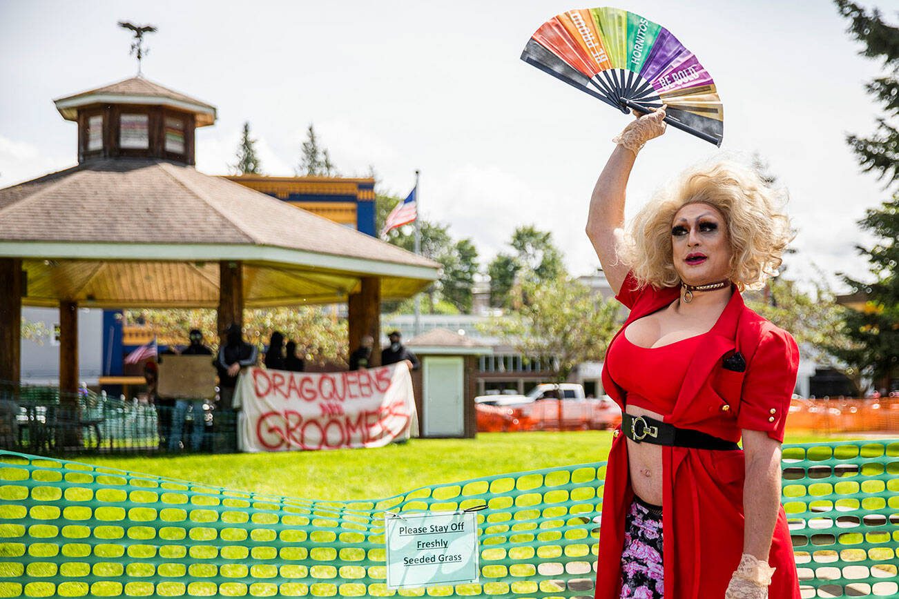 Murphy’s Lala speaks to a crowd at Arlington’s first-ever Pride celebration telling them to “pay them no mind” in response to the Pride protestors on Saturday, June 4, 2022. (Olivia Vanni / The Herald)