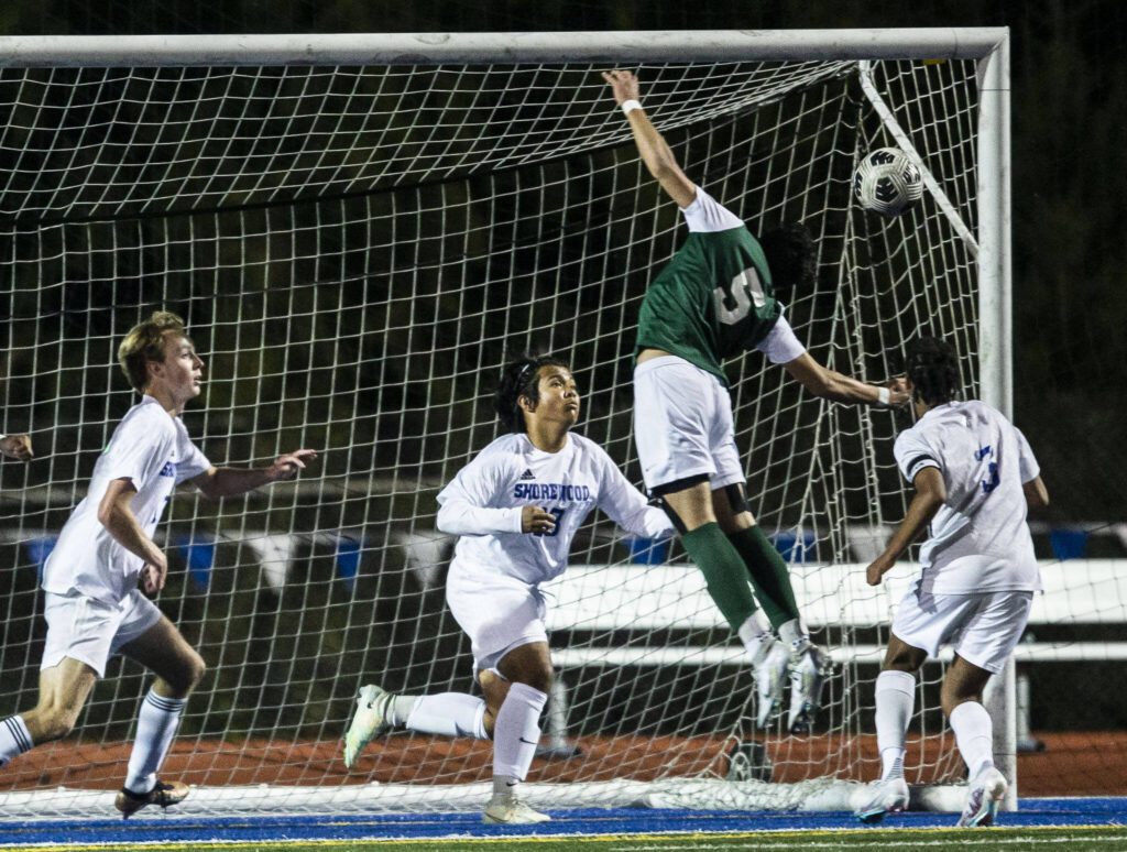 Edmonds-Woodway’s Anand Raghu misses the goal with a header during the game against Shorewood on Tuesday, May 9, 2023 in Shoreline, Washington. (Olivia Vanni / The Herald)
