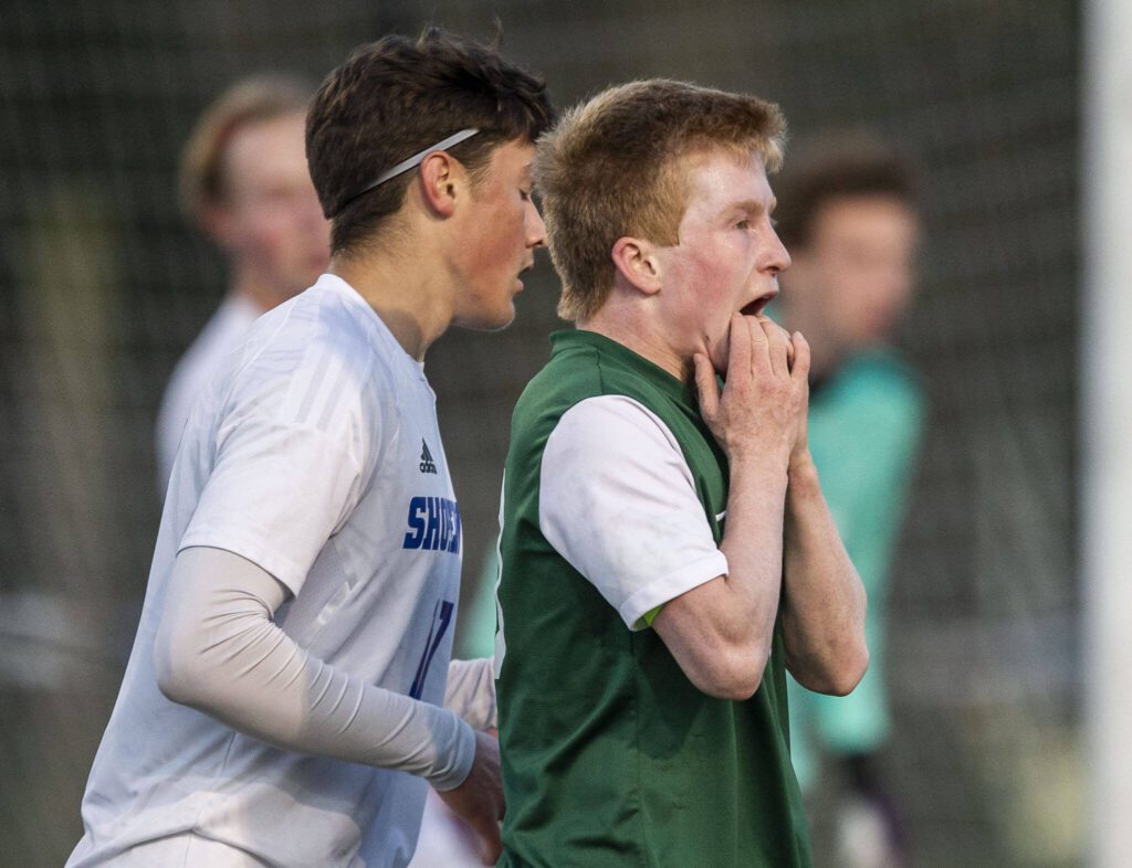 Edmonds-Woodway’s Ben Hanson reacts to missing a shot during the game against Shorewood on Tuesday, May 9, 2023 in Shoreline, Washington. (Olivia Vanni / The Herald)
