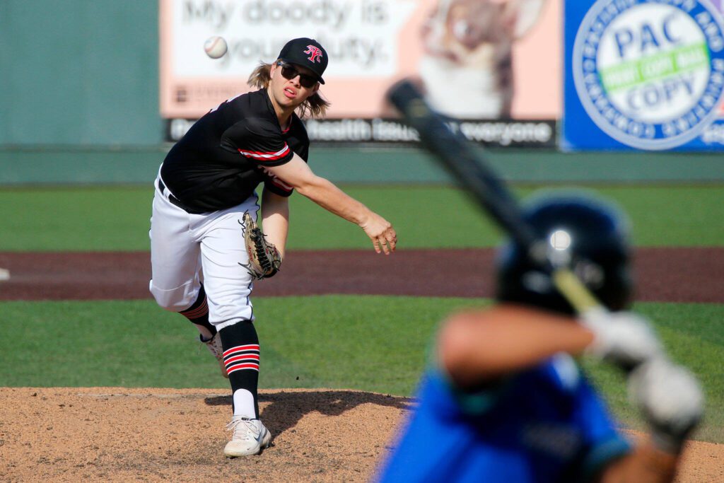 Mountlake Terrace’s Dayton Nickolson delivers a pitch against Shorewood in a Wesco 3A District 1 semifinal on Tuesday, May 9, 2023, at Funko Field in Everett, Washington. (Ryan Berry / The Herald)

