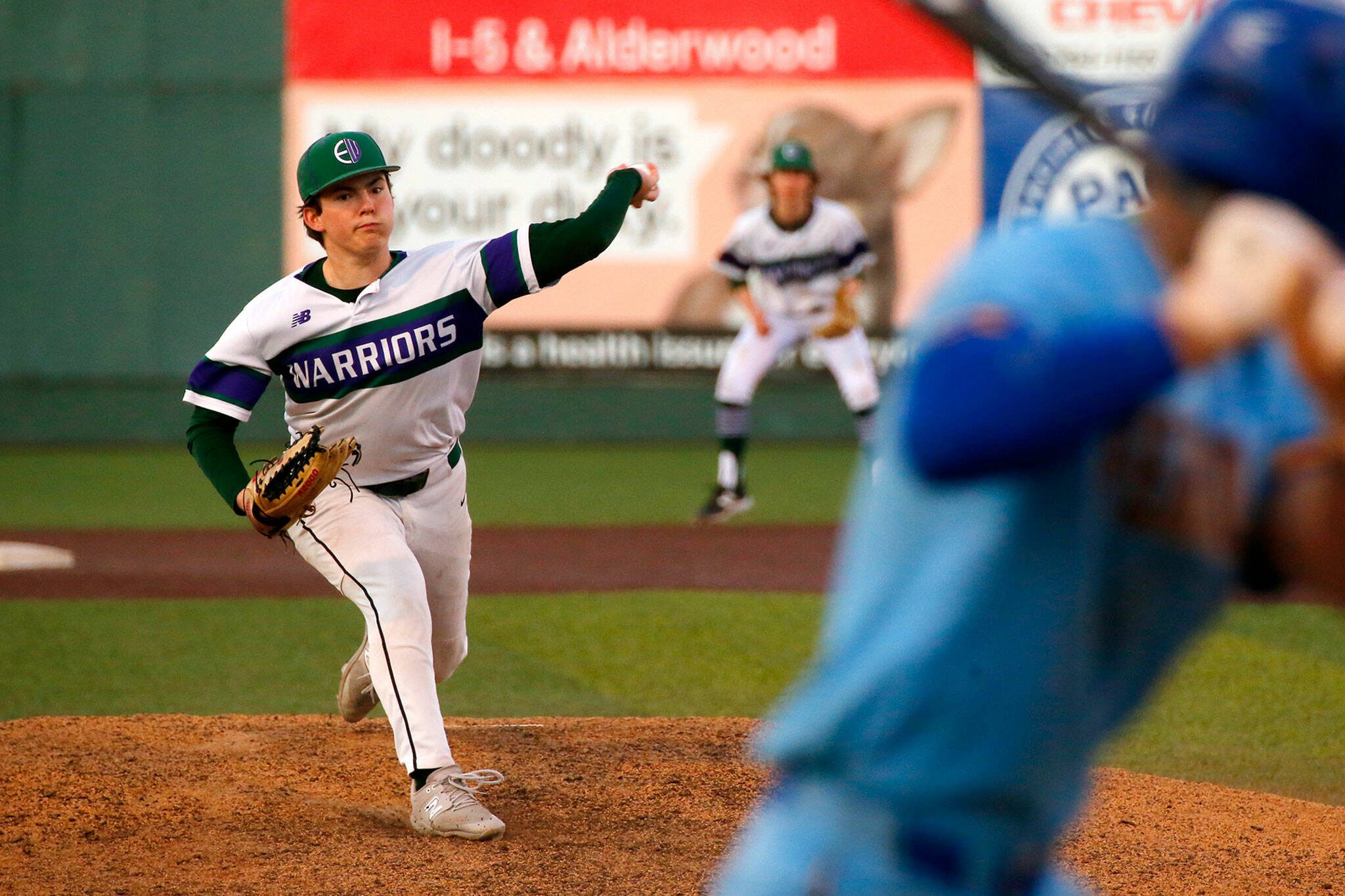 Edmonds-Woodway pitcher Jens Simonsen delivers a pitch against Ferndale in a Wesco 3A District 1 semifinal on Tuesday, May 9, 2023, at Funko Field in Everett, Washington. (Ryan Berry / The Herald)