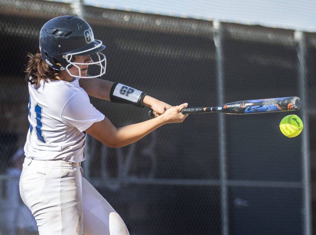 Glacier Peak’s Ashleigh Wojcik hits the ball during a game against Lake Stevens on Wednesday, May 10, 2023, in Snohomish, Washington. (Olivia Vanni / The Herald)
