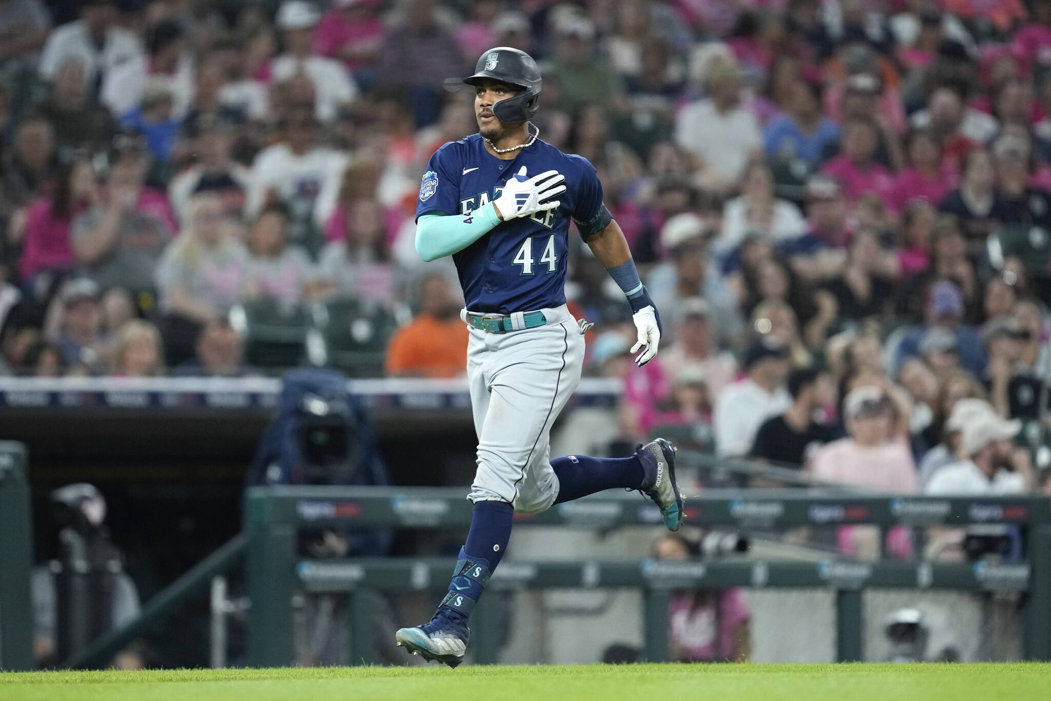 The Mariners’ Julio Rodriguez rounds third base after hitting a two-run home run against the Tigers in the ninth inning of a game Friday in Detroit. (AP Photo/Paul Sancya)