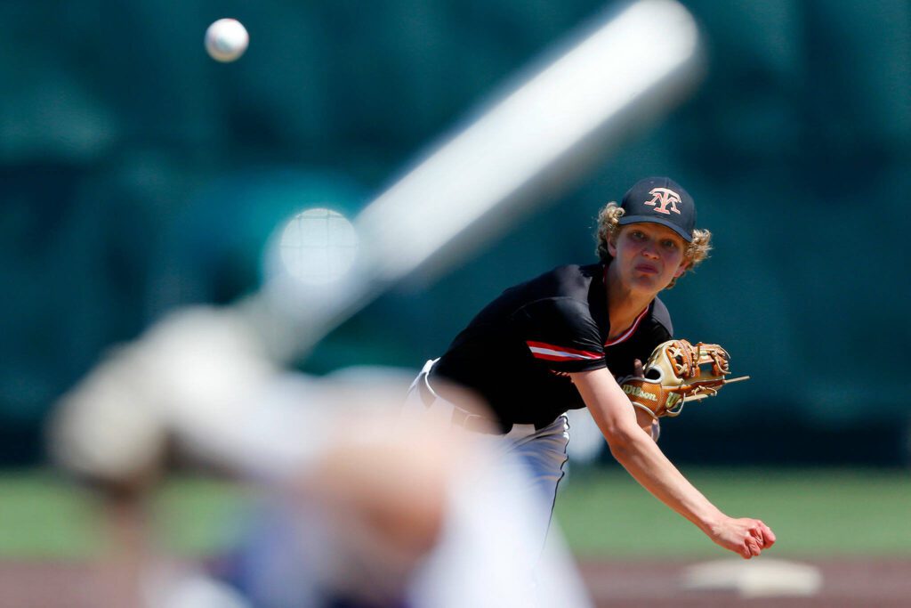 Mountlake Terrace’s Robert Swan deals against Edmonds-Woodway in the 3A District title game on Saturday, May 13, 2023, at Funko Field in Everett, Washington. (Ryan Berry / The Herald)
