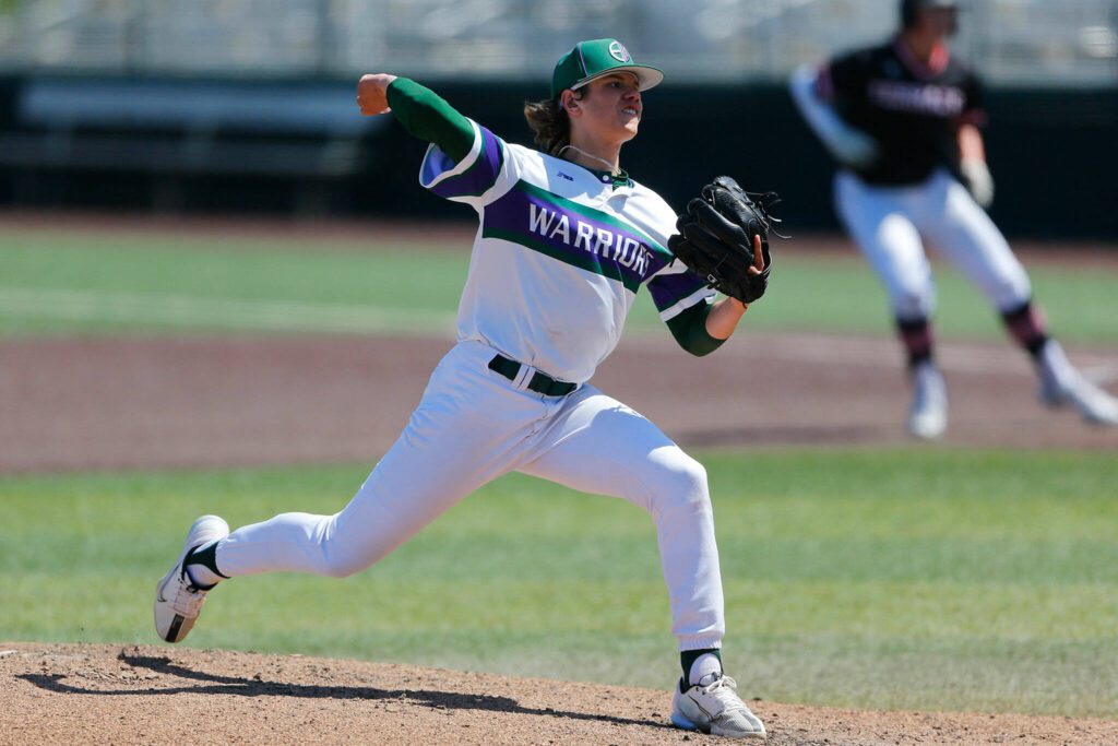 Edmonds-Woodway starting pitcher Dylan Schlenger works his way out of a jam against Mountlake Terrace in the 3A District title game on Saturday, May 13, 2023, at Funko Field in Everett, Washington. (Ryan Berry / The Herald)
