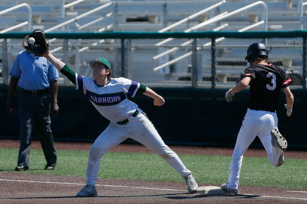 Mountlake Terrace’s Ryan Sturgill is called out on a close play at first against Edmonds-Woodway in the 3A District title game on Saturday, May 13, 2023, at Funko Field in Everett, Washington. (Ryan Berry / The Herald)
