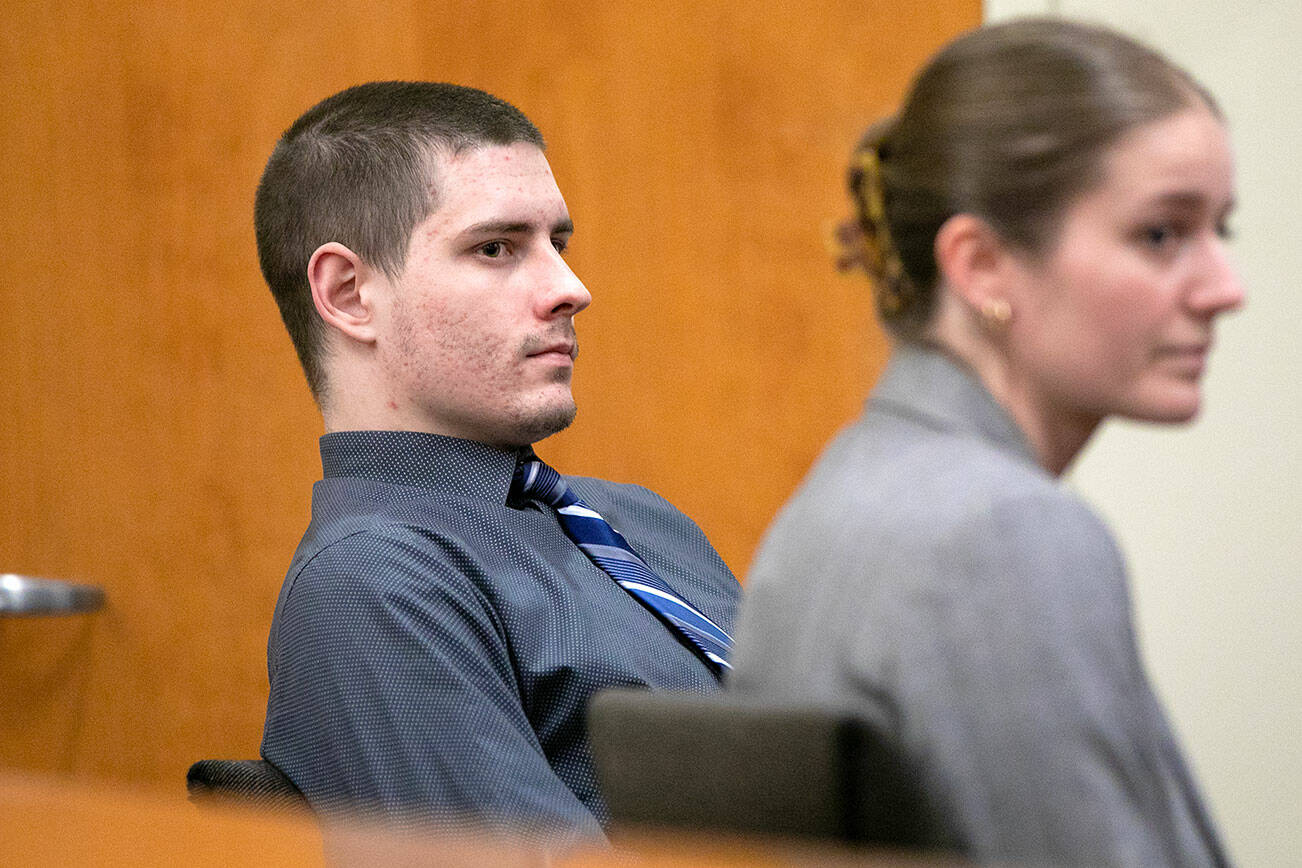 Shayne Baker watches as the jury is polled after delivering their verdicts on Monday, May 15, 2023, at Snohomish County Superior Court in Everett, Washington. (Ryan Berry / The Herald)