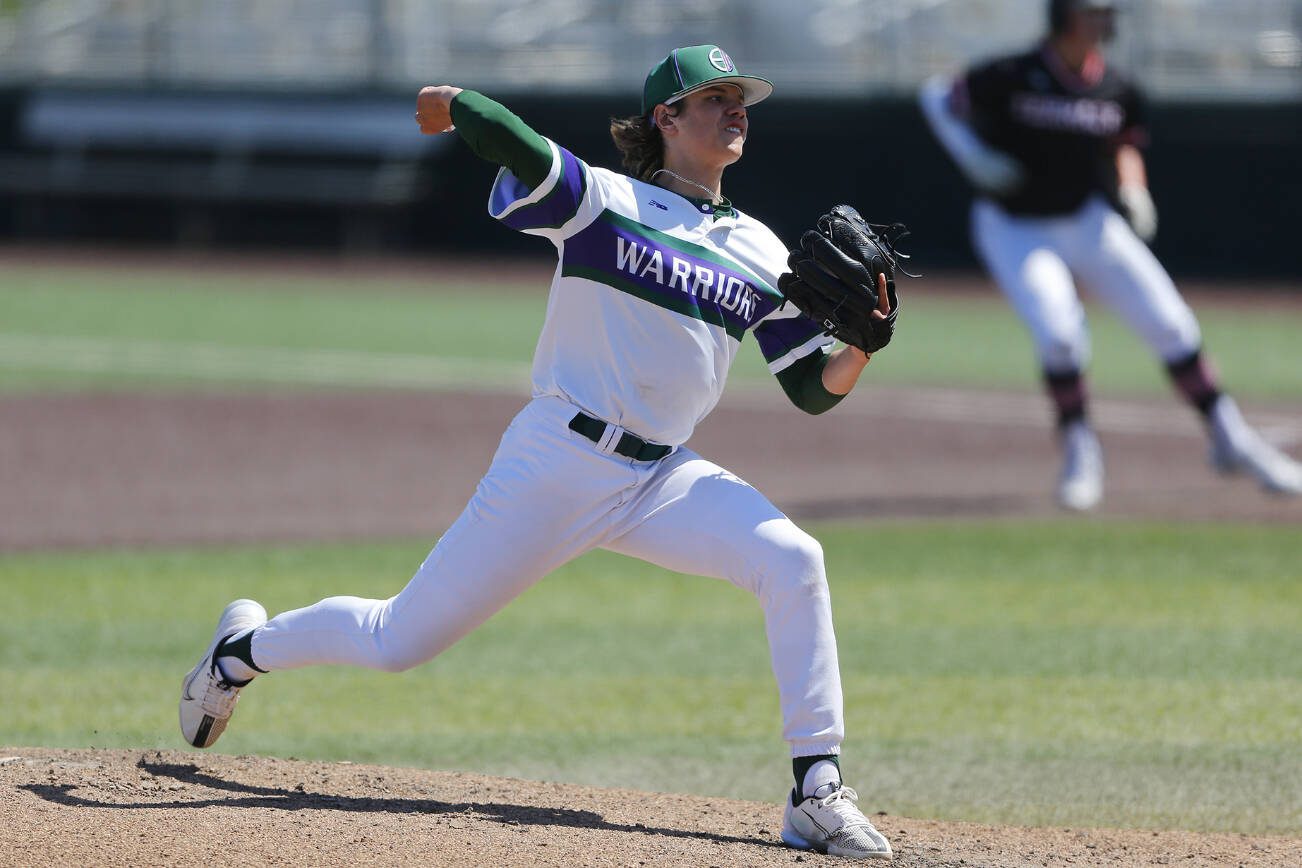 Edmonds-Woodway starting pitcher Dylan Schlenger works his way out of a jam against Mountlake Terrace in the 3A District title game on Saturday, May 13, 2023, at Funko Field in Everett, Washington. (Ryan Berry / The Herald)