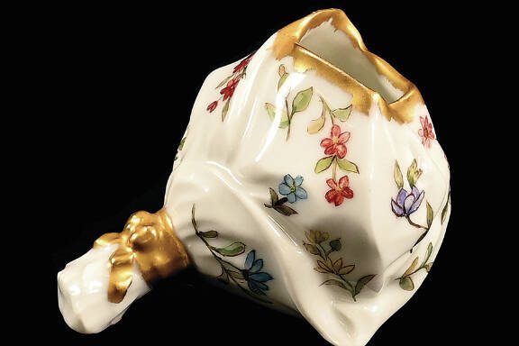 This Limoges porcelain piece originally held toothpicks. Now, it has found a new purpose, even if it’s simply an attractive addition to a collection.