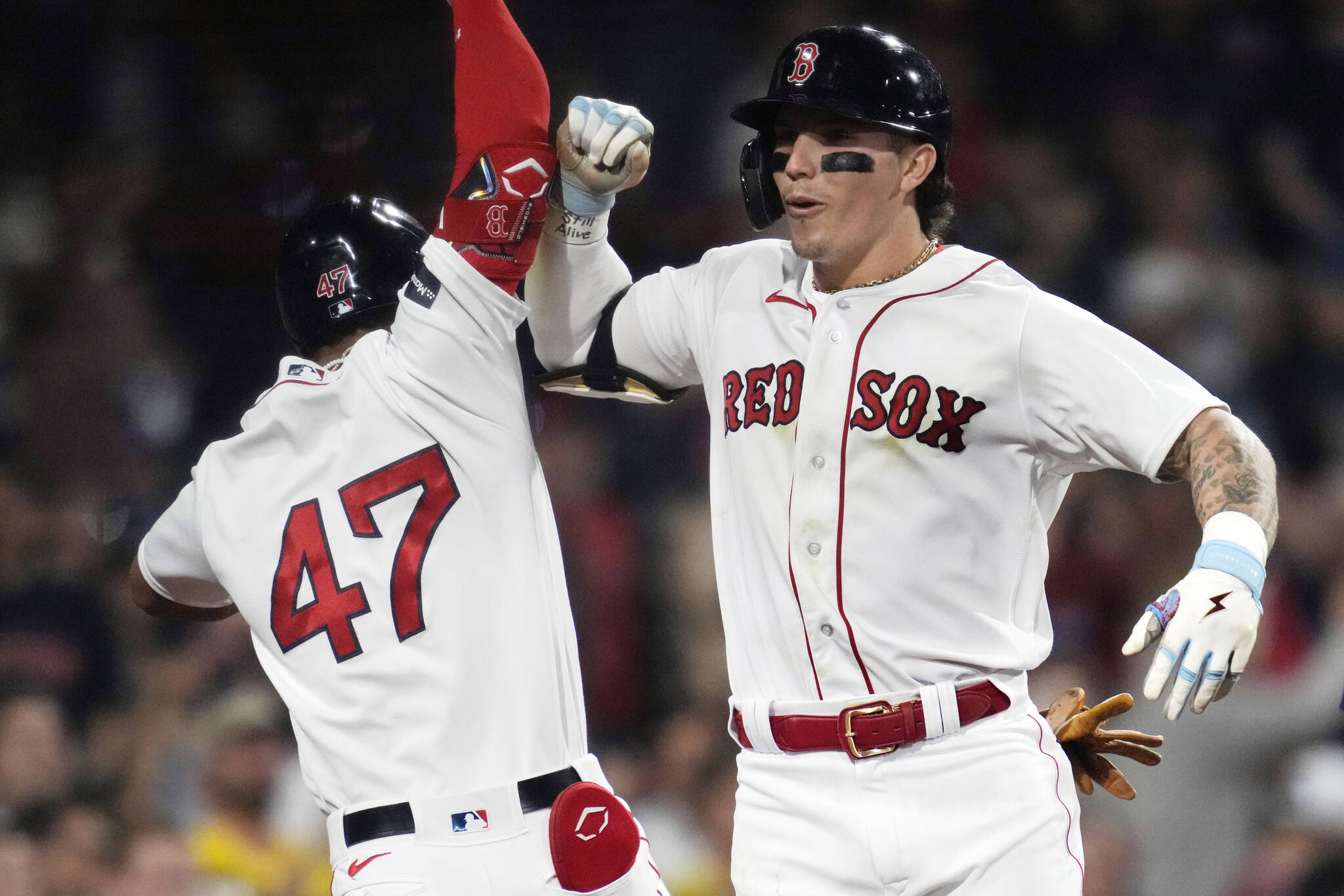 The Red Sox’s Jarren Duran celebrates after his solo home run in the fifth inning of a game against the Mariners on Tuesday at Fenway Park in Boston. (AP Photo/Charles Krupa)