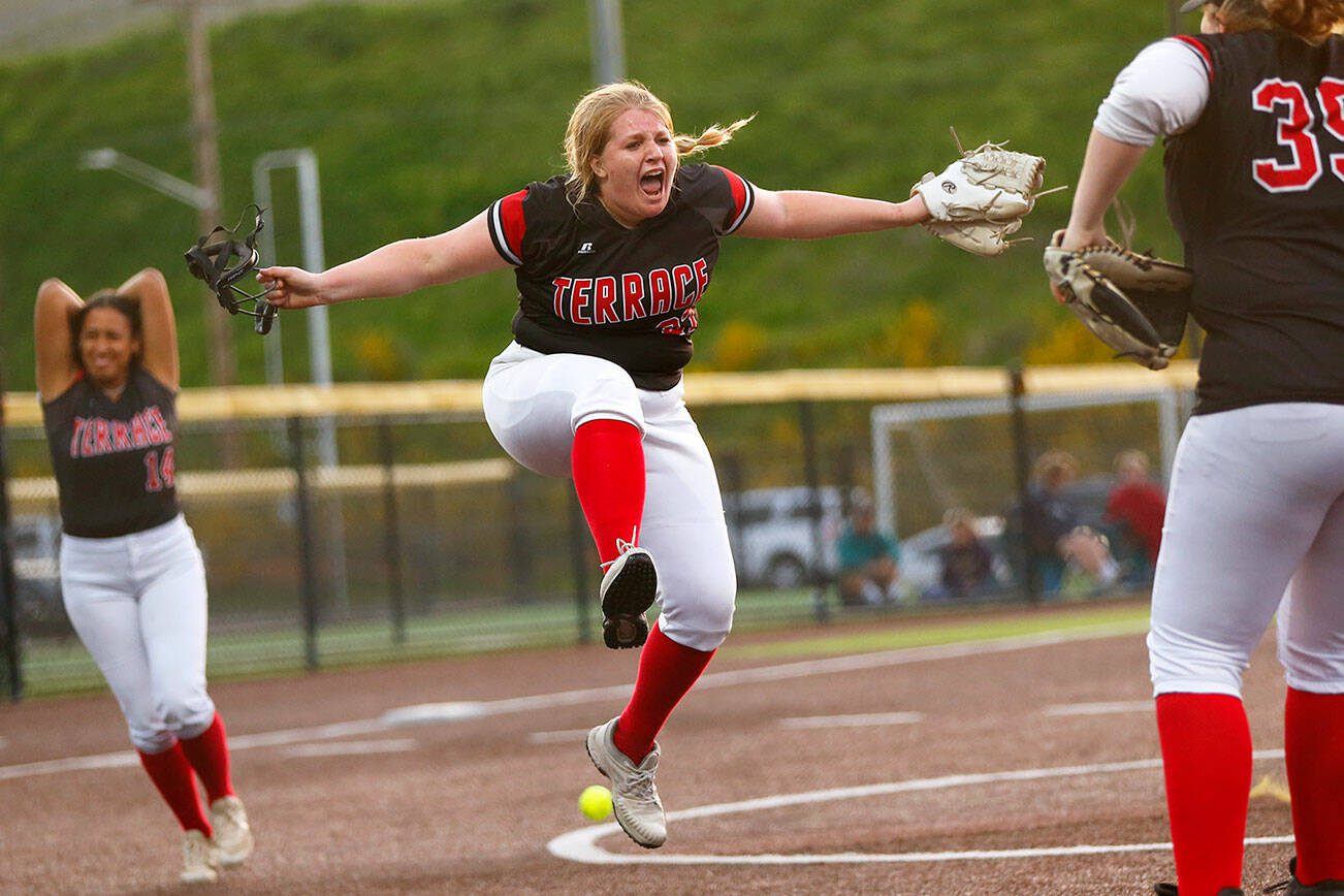 Mountlake Terrace pitcher Ellie Gilbert jumps in the air after sealing an extra-inning victory over Cascade during the Class 3A District 1 softball tournament Tuesday, May 16, 2023, at the Phil Johnson Ballfields in Everett, Washington. (Ryan Berry / The Herald)