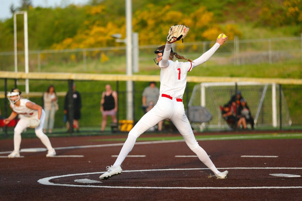 Stanwood’s Megan Stulc winds up to pitch against Snohomish during the Class 3A District 1 softball tournament Tuesday, May 16, 2023, at the Phil Johnson Ballfields in Everett, Washington. (Ryan Berry / The Herald)
