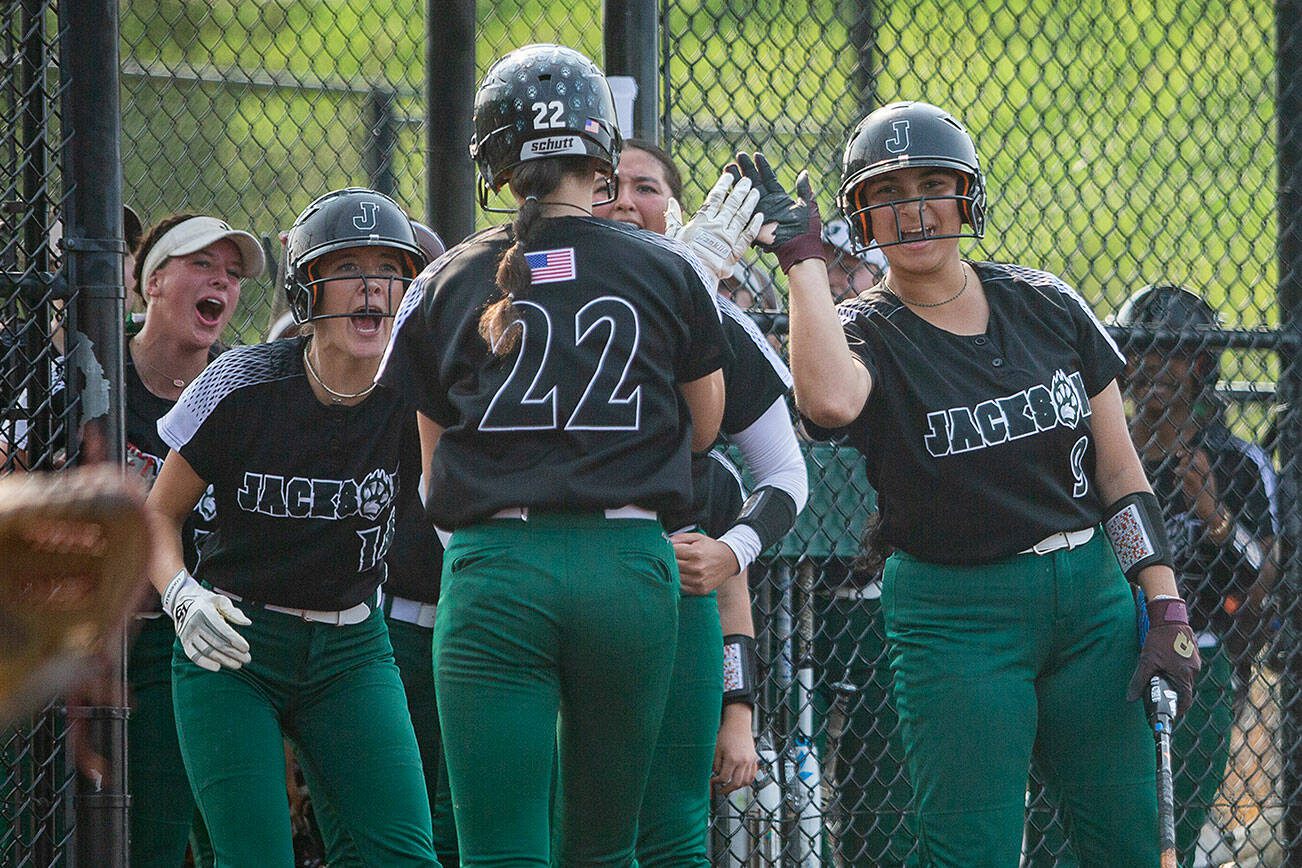 Jackson’s Allie Thomsen is congratulated by her teammates after scoring during the game against Skyline on Wednesday, May 17, 2023 in Everett, Washington. (Olivia Vanni / The Herald)