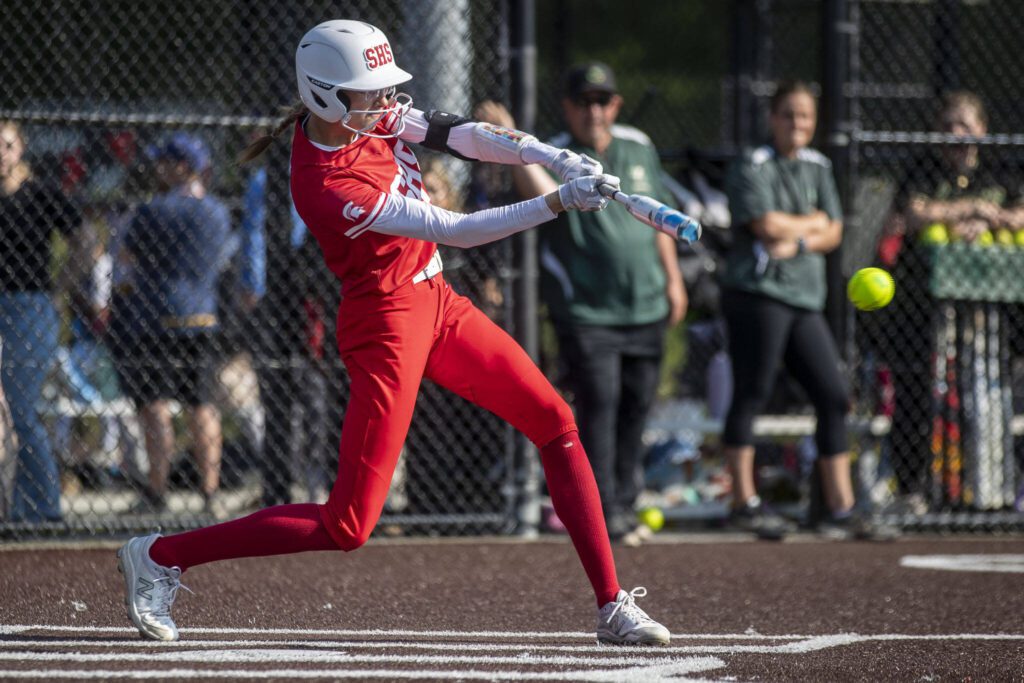 Stanwood’s Megan Stulc (1) hits the ball during a game between Marysville Getchell and Stanwood at Phil Johnson Ballfields in Everett, Washington on Thursday, May 18, 2023. Stanwood won, 12-1. (Annie Barker / The Herald)
