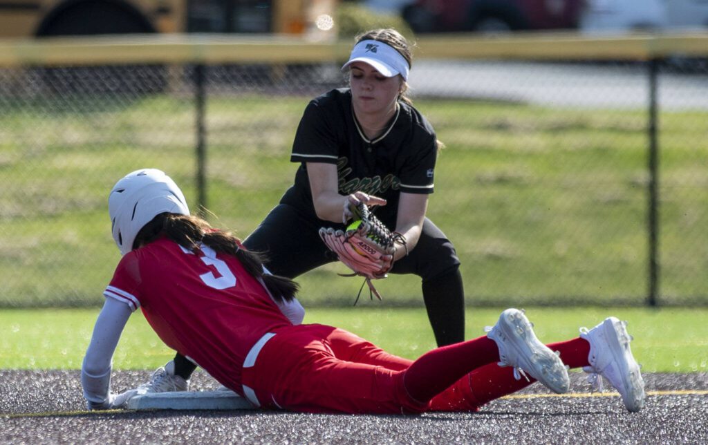 Stanwood’s Rubi Lopez (3) slides into second during a game between Marysville Getchell and Stanwood at Phil Johnson Ballfields in Everett, Washington on Thursday, May 18, 2023. Stanwood won, 12-1. (Annie Barker / The Herald)
