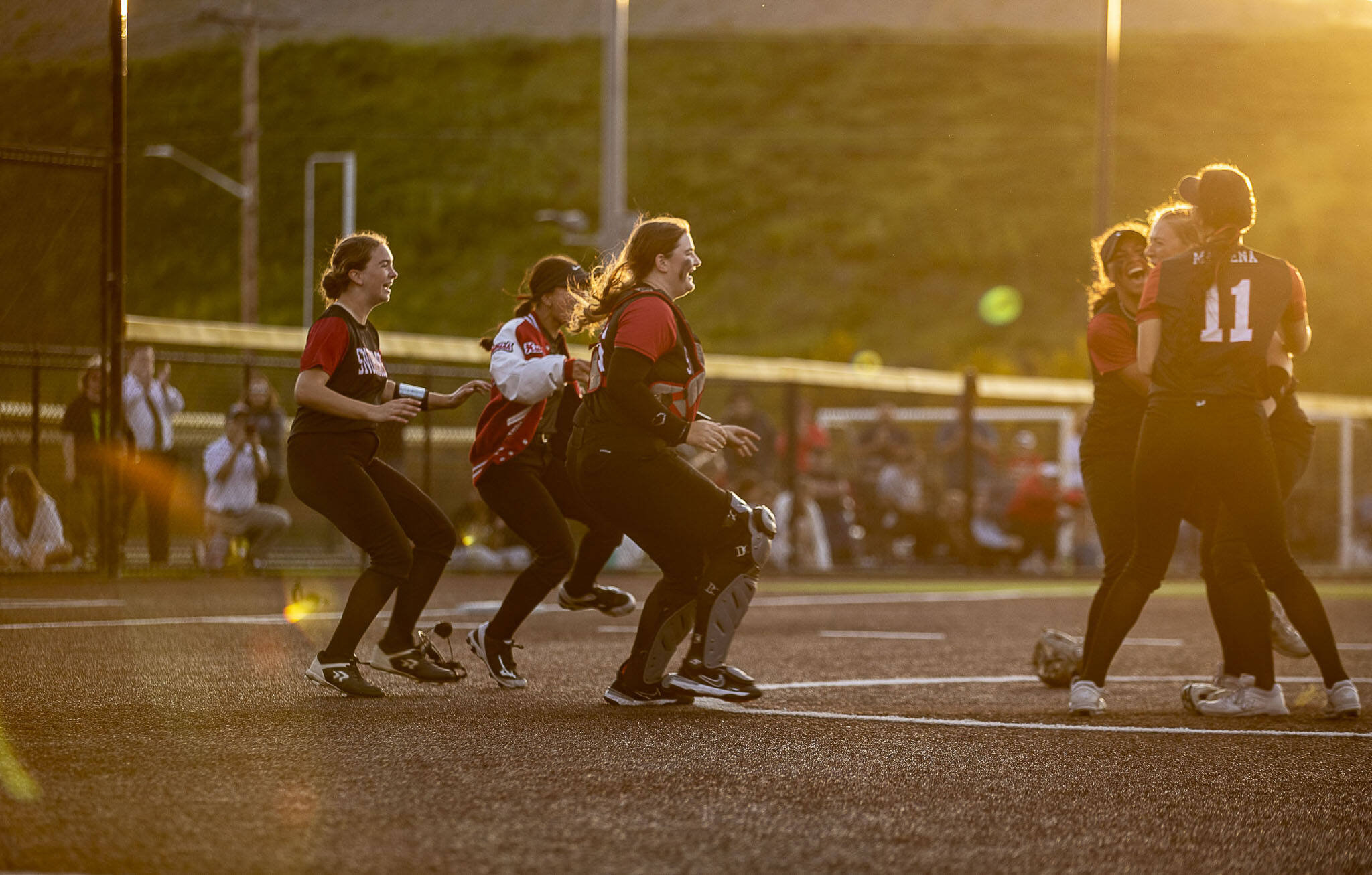 Snohomish players celebrate during a game between Mountlake Terrace and Snohomish at Phil Johnson Ballfields in Everett, Washington on Thursday, May 18, 2023. Snohomish won, 4-0. (Annie Barker / The Herald)