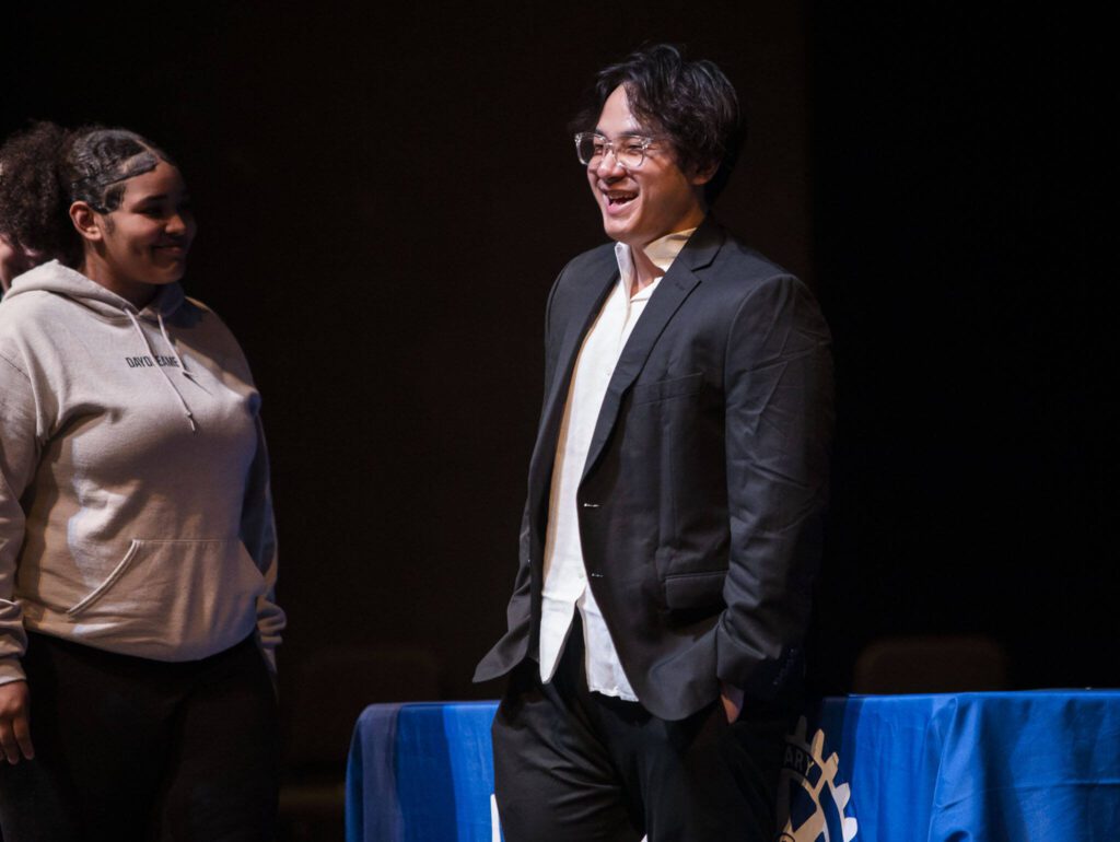 Aung Aung smiles after receiving an Everett Rotary Club Scholarship during the Rotary Club of Everett Awards on Monday, May 22, 2023 in Everett, Washington. (Olivia Vanni / The Herald)
