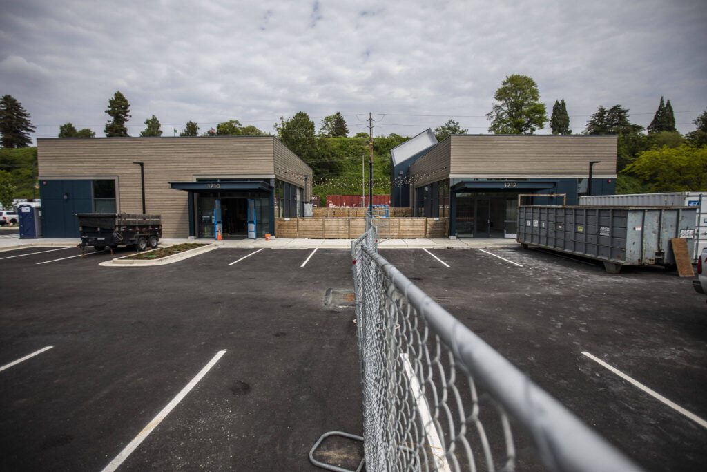 Outside of two new businesses, Sound2Summit Craft Brewery and Woods Coffee, that will be opening soon in Everett Marina Village at the Port of Everett on Wednesday, May 24, 2023 in Everett, Washington. (Olivia Vanni / The Herald)
