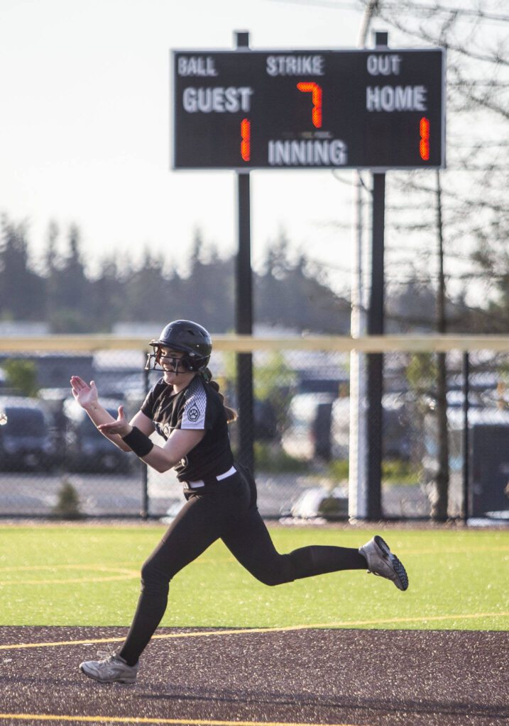 Jackson’s Hailey Pelletier claps while running the bases after hitting a homer to give Jackson the lead during the game against Bothell on Friday, May 19, 2023 in Everett, Washington. (Olivia Vanni / The Herald)
