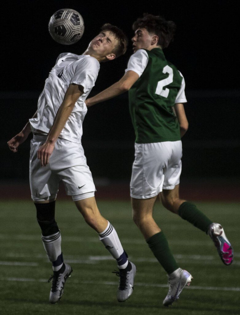 Mead’s Wes Starley (10) heads the ball during a game between Edmonds-Woodway and Mead at Edmonds-Wooday High School in Edmonds, Washington on Friday, May 19, 2023. Edmonds-Woodway won, 2-0. (Annie Barker / The Herald)
